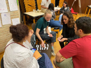 4 youth working on a task