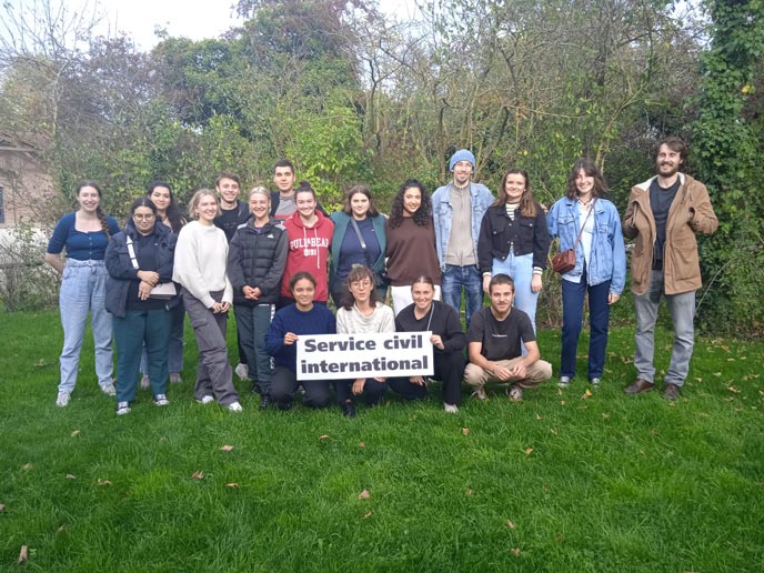 a group of people smiling for a picture