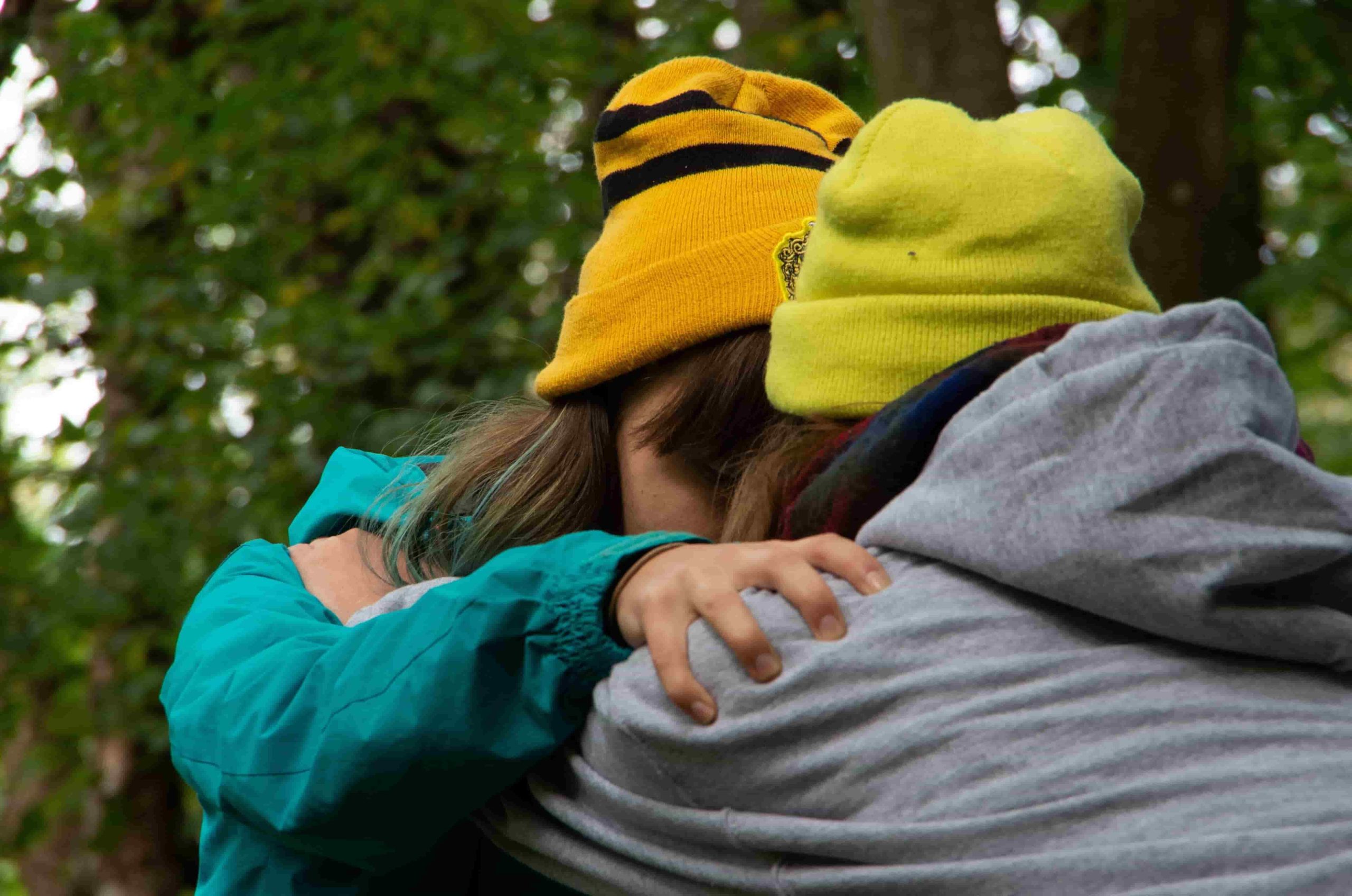 Two people embracing each other