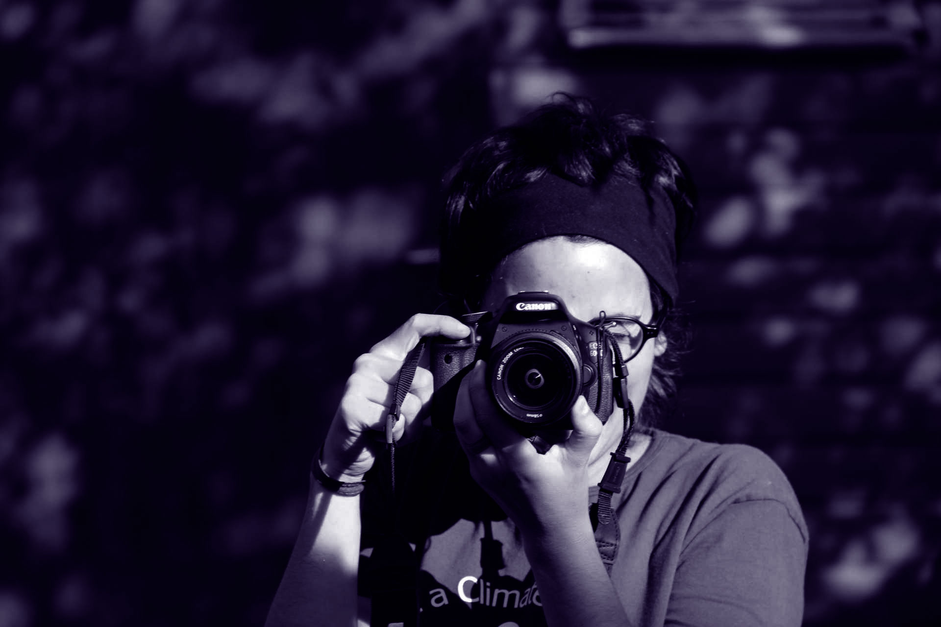 Someone taking a photo with a digital camera