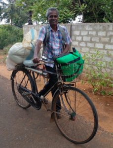 Sunil bringing back the rations on his bike