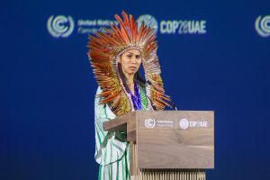 Isabel Prestes Da Fonseca making a speech at COP28